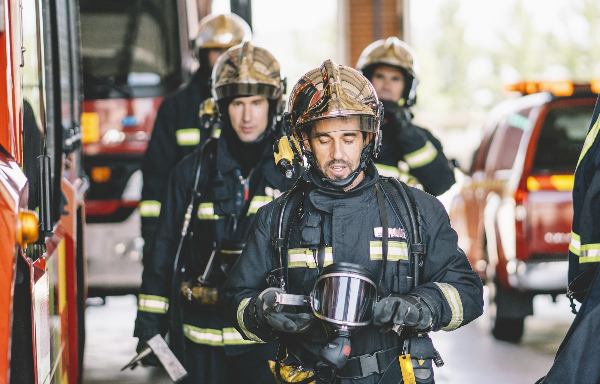 Firemen working at fire station.